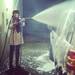 A car is washed by night. (rogerhensley)